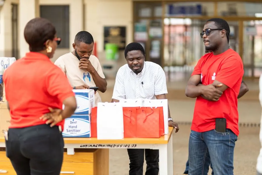 Volunteers distributing health supplies